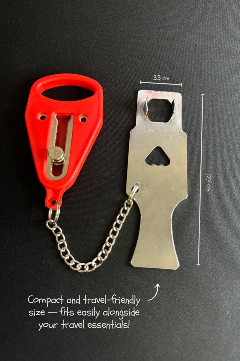 Portable door lock laid flat with its chain, showing its compact size