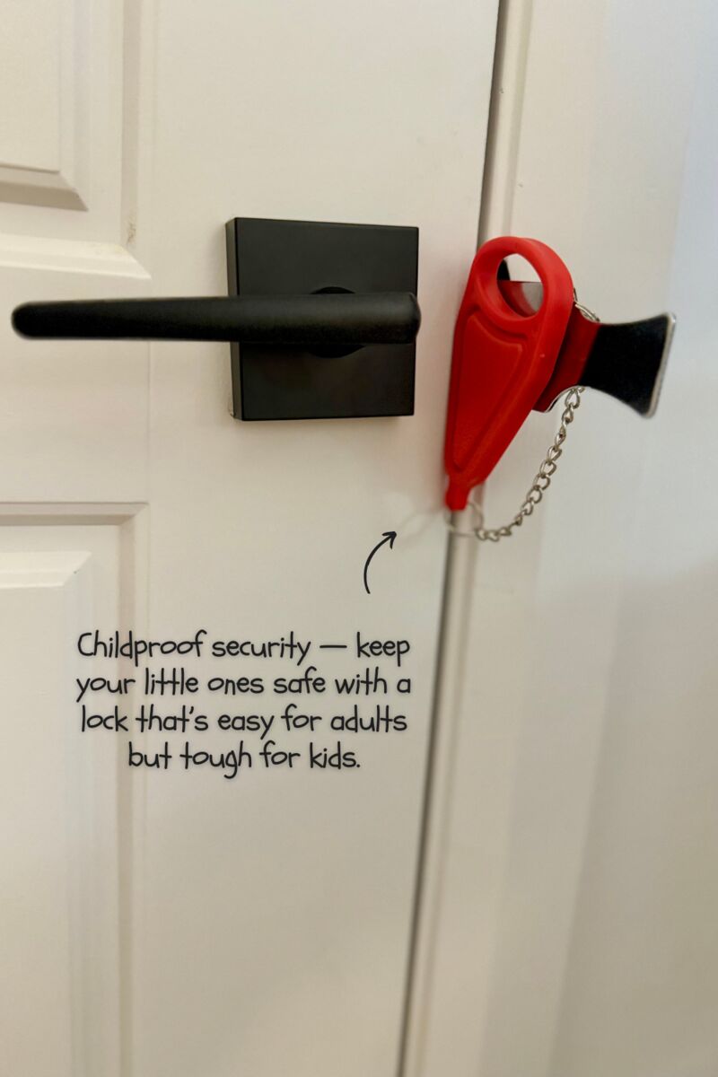 Portable door lock installed below a door handle